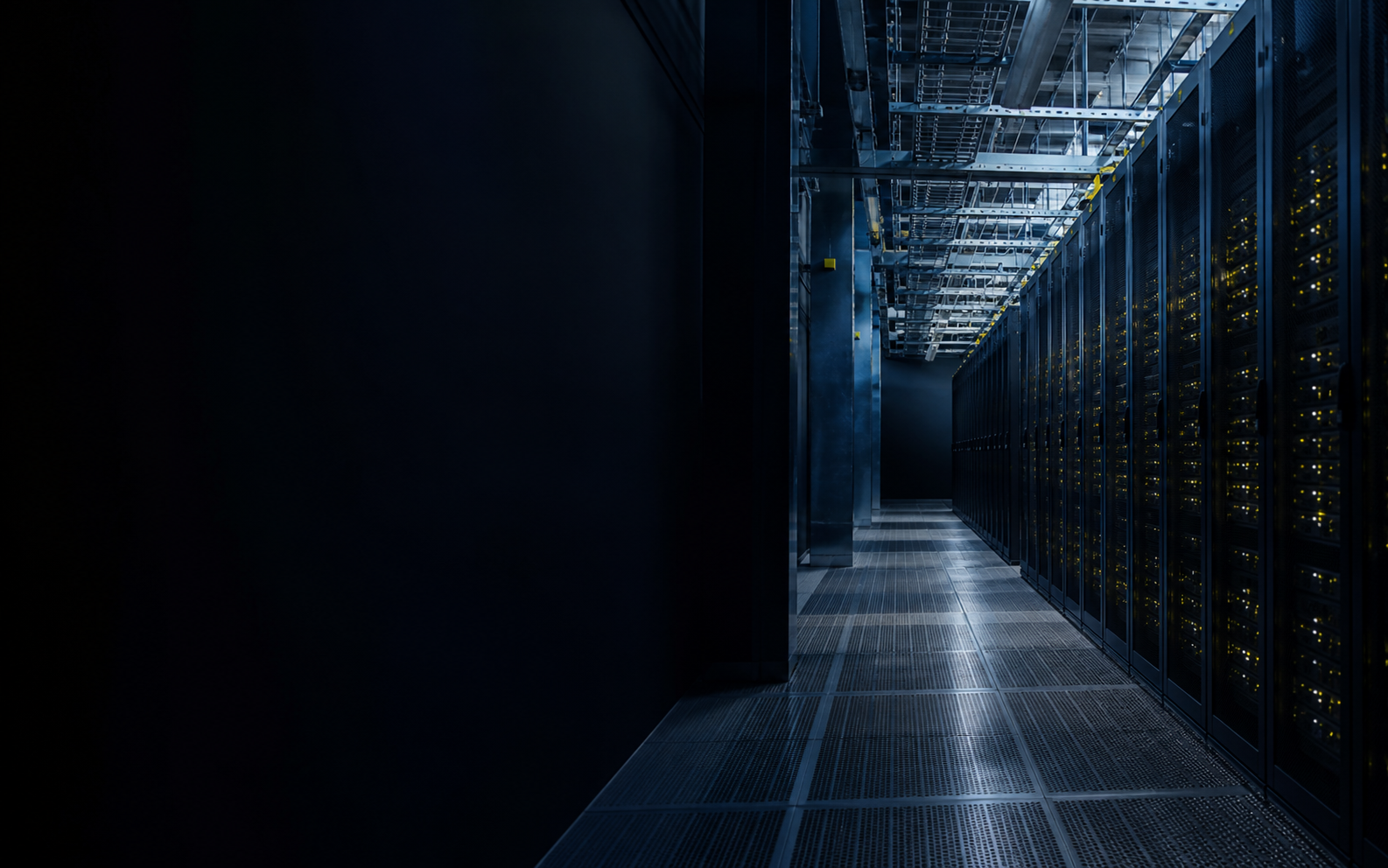 A dark high-density data center aisle